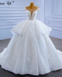 فساتين زفاف فاخرة بيضاء من Serene Hill فساتين زفاف فاخرة مطرزة باللؤلؤ وأربطة للعروس Hm67306 فساتين زفاف مصنوعة حسب الطلب