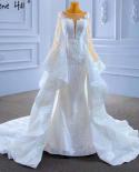 سيرين هيل فساتين زفاف بيضاء إسلامية من Serene Hill فساتين زفاف 2022 أنيقة من الدانتيل بتصميم حورية البحر Hm67416 زفاف