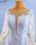 سيرين هيل فساتين زفاف بيضاء إسلامية من Serene Hill فساتين زفاف 2022 أنيقة من الدانتيل بتصميم حورية البحر Hm67416 زفاف