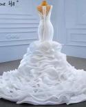 فساتين زفاف Serene Hill بيضاء مكشكشة مطرزة بالخرز 2023 بدون أكمام فساتين عروس فاخرة عالية الجودة Hm67413 مخصصة لحفلات الزفاف