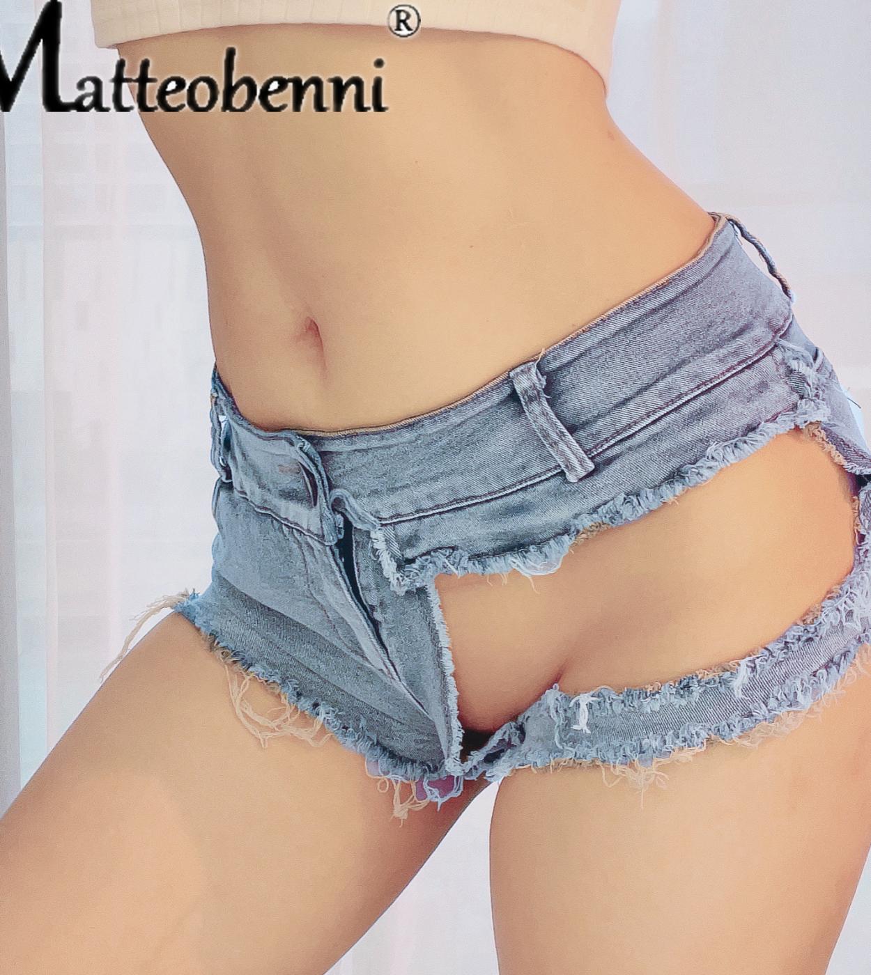 Pantalones cortos de mezclilla de cintura baja para mujer Primavera Verano Denim Algodón Agujero Empalme Ladies Skinny Booty Sho