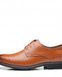 Scarpe eleganti da uomo classiche piatte Calzature Oxford formali italiane intagliate con punta alare in vera pelle Taglie forti