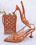 Qsgfc Nigeria Popular Beautiful Orange Hollow Design High Heels Comfortable To Wear Party Ladies Shoes And Bag