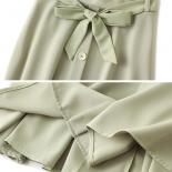 חצאיות מידי בסיסיות לנשים עם חזה יחיד בסגנון harajuku קשת מותן גבוהה קשורה זורמת חצאית נדנדה קו 2023 אביב k40