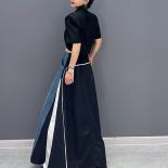 تشينغ مو 2023 ربيع الخريف جديد غير رسمي قطعة واحدة الدنيم تنورة المرأة موضة الأزرق الأسود المرقعة تنورة Zxf3289