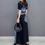 تشينغ مو 2023 صيف جديد امرأة الدنيم نصف تنورة موضة عادية لصق شخصية العصرية فتاة الأسود والأزرق تنورة Zy037