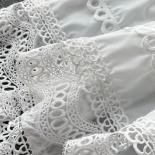 קיץ שחור/לבן רקמת תחרה חלולה שמלה ארוכה שמלה אלגנטית צווארון עגול ללא שרוולים ווסטיד מקסי חד חזה