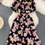 Robe d'été Vintage à fleurs pour femmes, longueur aux genoux, élégante, col en V, manches courtes bouffantes, grande balançoire,
