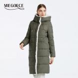 Miegofce 2023 Winter Collection Simple Long Coat  Hooded Windproof Jacket Women's Faux Fur Stitching Design Casual Parka