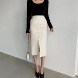 שחור דק ישר חצאיות דמוי עור נשים אביב חבילה חדשה היפ ארוך pu jupe שיק עיצוב מפוצל אופנה מוצק mujer