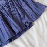 Falda corta de gasa lisa para mujer, minifalda plisada con cintura elástica a la moda, informal, para playa, 2023
