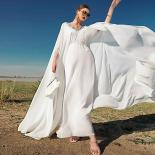 Luxueux Cape manches en mousseline de soie 2023 mariage brillant longue robe de soirée Banquet festif strass robe de bal pour le