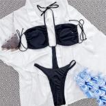 ملابس سباحة سوداء بدون ظهر مع رسن قطعة واحدة ملابس سباحة مونوكيني للنساء 2024 بدلة استحمام عالية القطع سلسلة بأربطة للسباحة