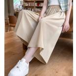 Pantalones de falda de mujer de algodón con cintura elástica y pierna ancha, pantalones recortados con bolsillo, pantalones casu