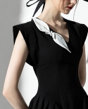 שמלה נקבה 2022 חדשה צרפתית רטרו בסגנון הפבורן שמלה שחורה דקה חצאית טמפרמנט עם צווארון V