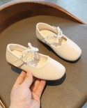 Nuevos zapatos de cuero para niños, zapatos de princesa con lazo de perlas, zapatos de suela blanda