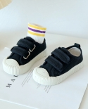 أحذية قماشية جديدة وعصرية للبنات والأولاد بلون الحلوى أحذية رياضية كاجوال للأطفال من الفيلكرو