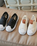 Zapatos informales inferiores suaves transpirables de malla para niños en blanco y negro para niños y niñas