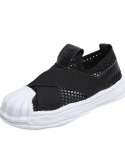حذاء كاجوال شبكي للأطفال باللونين الأبيض والأسود يسمح بمرور الهواء من الأسفل وناعم للأولاد والبنات