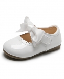 Zapatos informales bonitos con punta redonda y suela blanda para bebé con lazo para niñas
