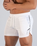 2022 מכנסי ריצה קצרים לגברים קיץ יבש מהיר חדר כושר כושר ספורט גברים מכנסי ספורט קצרים בגדי חוף אימון אימון קצר