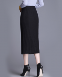 Zoki Falda de punto para mujer Otoño Cintura alta Grueso Negro Elástico Falda de tubo de un solo pecho Moda Invierno Midi Faldas