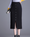 Zoki Falda de punto para mujer Otoño Cintura alta Grueso Negro Elástico Falda de tubo de un solo pecho Moda Invierno Midi Faldas