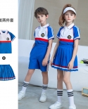 ملابس رياضية للأطفال من قطعتين باللونين الأزرق والأبيض
