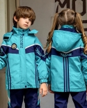 Ensemble trois pièces de survêtement bleu à capuche zippé pour enfants