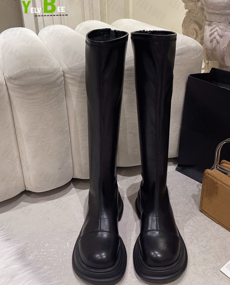 Botas largas outlet negras con plataforma