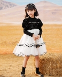 Vestido de punto para niñas Falda de rendimiento de malla Vestido de princesa de lentejuelas con costuras en blanco y negro