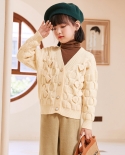 Giacca in maglione con scollo a V in maglia con fiocco in cardigan intrecciato spesso fatto a mano da bambina
