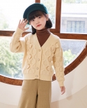 Giacca in maglione con scollo a V in maglia con fiocco in cardigan intrecciato spesso fatto a mano da bambina
